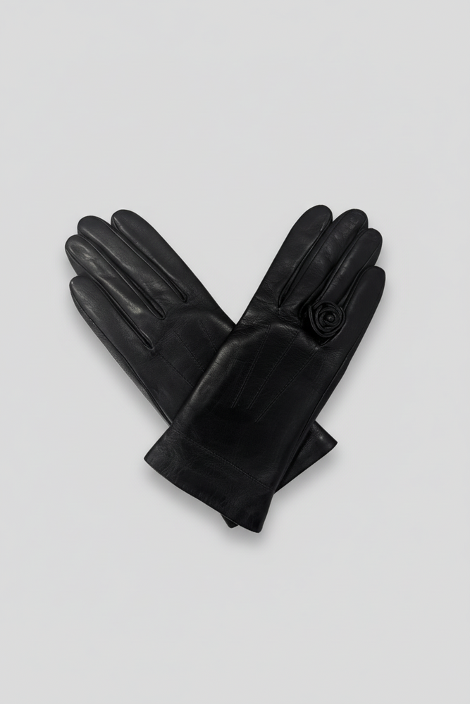 Black gloves on a grey background