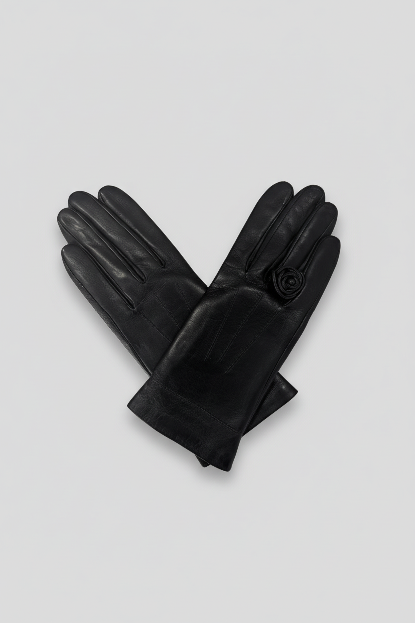 Black gloves on a grey background