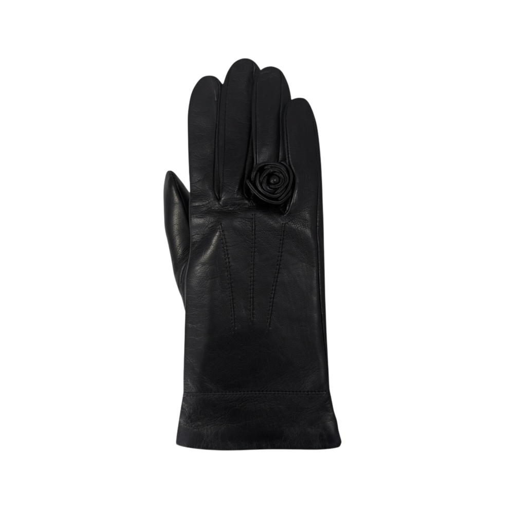 Black glove with a rose detail on a plain background
