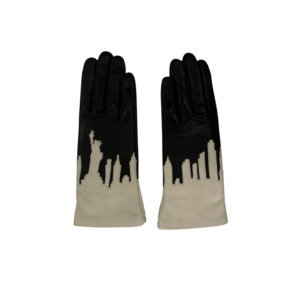 Newyork skyline leather gloves on plain background.