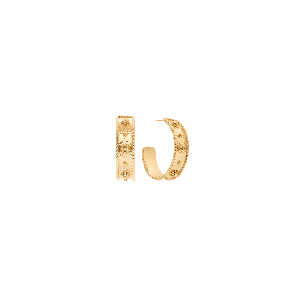 Gold hoop earrings on a white background