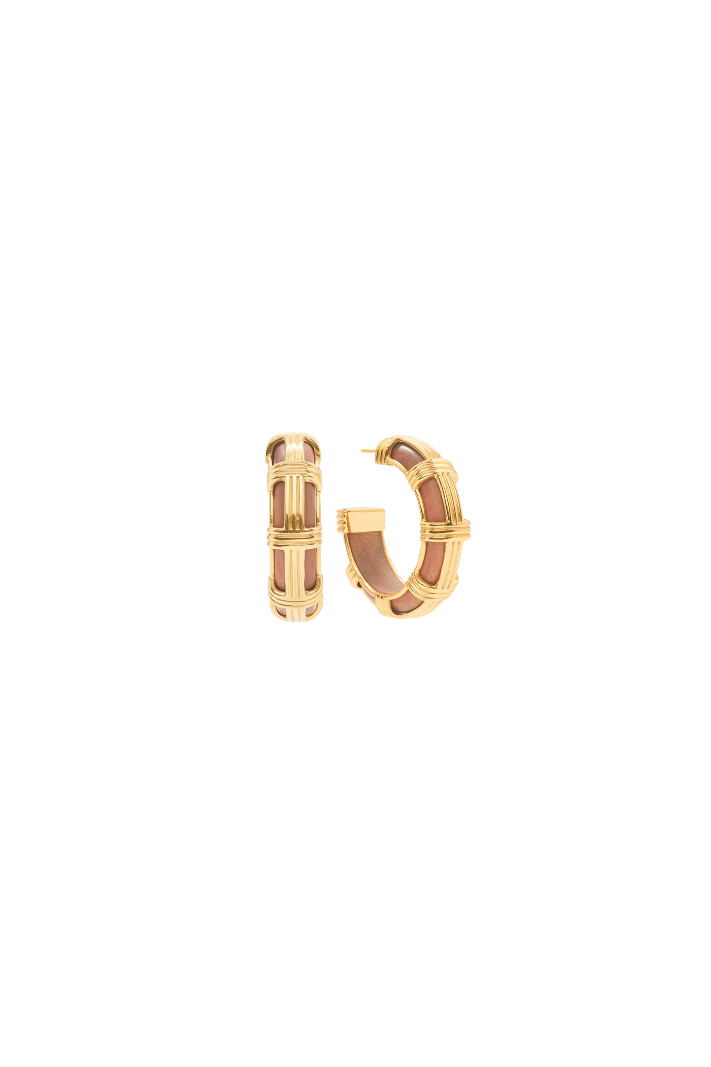 Gold hoop earrings on a white background