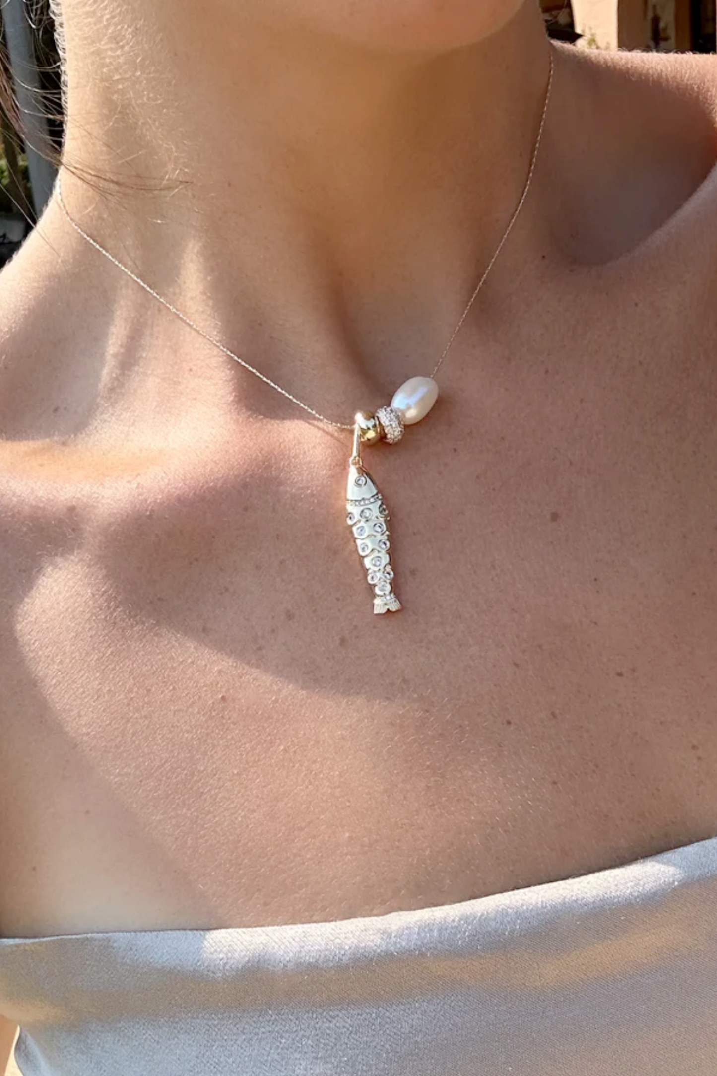 Gold plated fish shaped charm