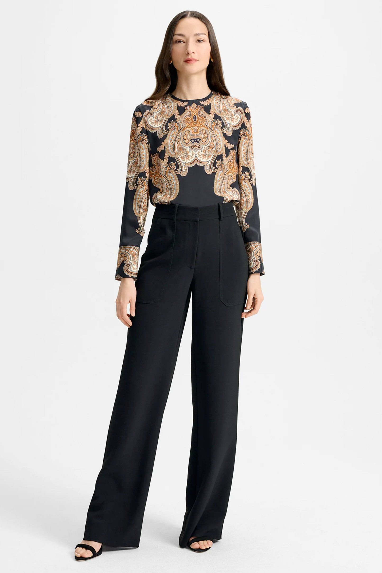 Model wearing black Veronica Beard pants.