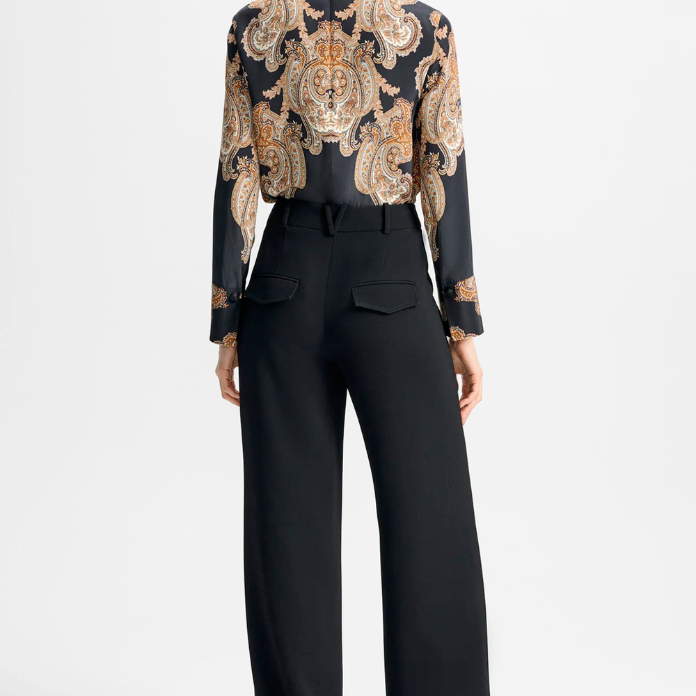 
                  
                    Model wearing black Veronica Beard pants.
                  
                